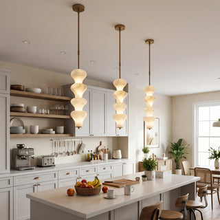 Trottola Alabaster Stacked Pendant Light Vidirlighting Single Black Stacked Alabaster Pendant Suspended over Round Pedestal Dining Table